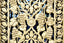 a close up of a decorative iron gate