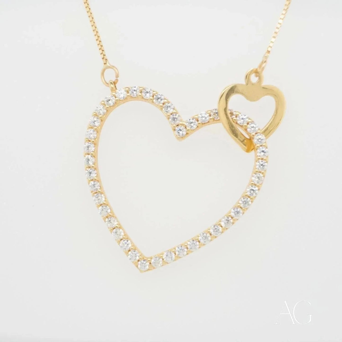Elegant 18k Gold Heart Necklace with diamond accents, luxurious gold jewelry piece