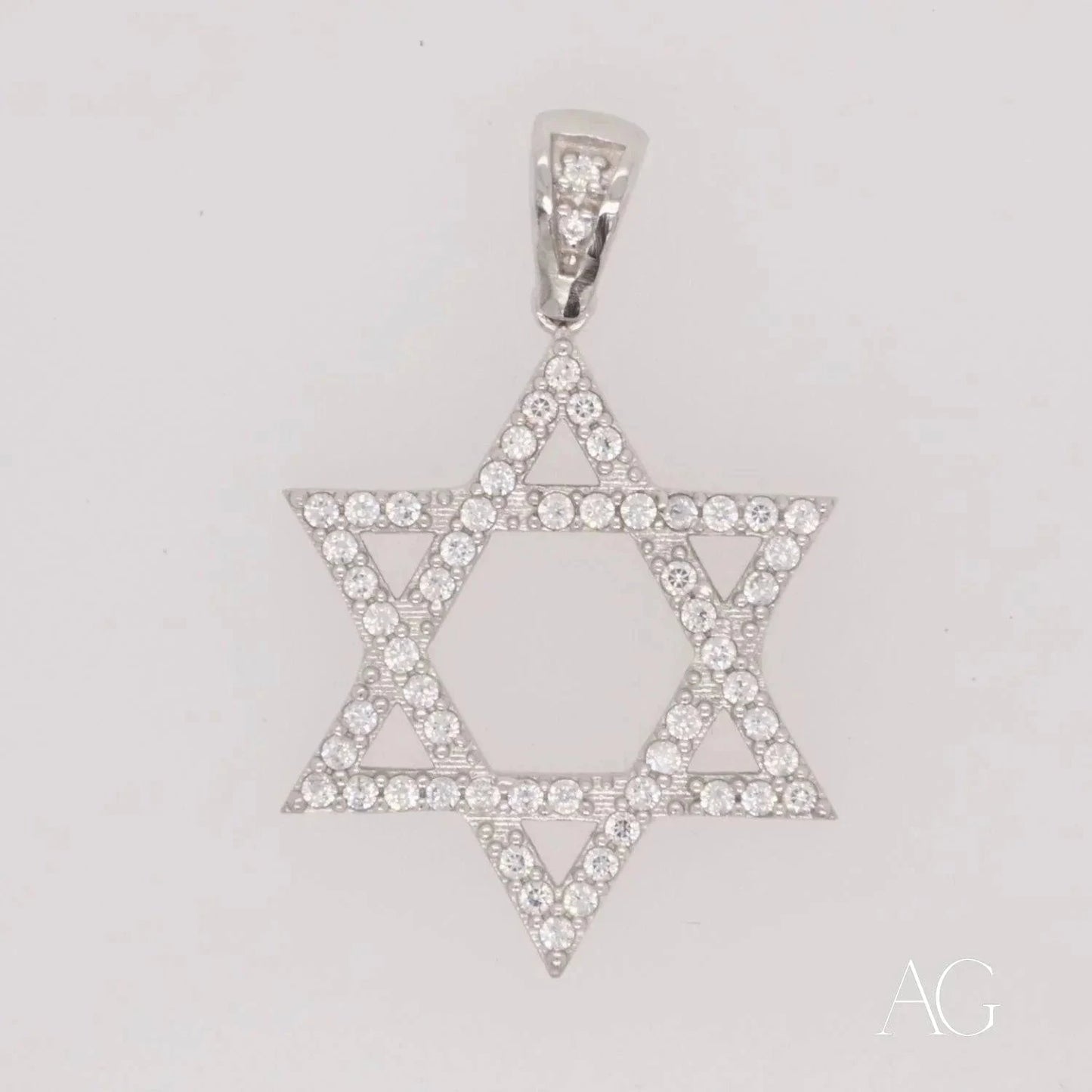 Elegant 18k White Gold Star of David pendant adorned with diamonds and CZ accents
