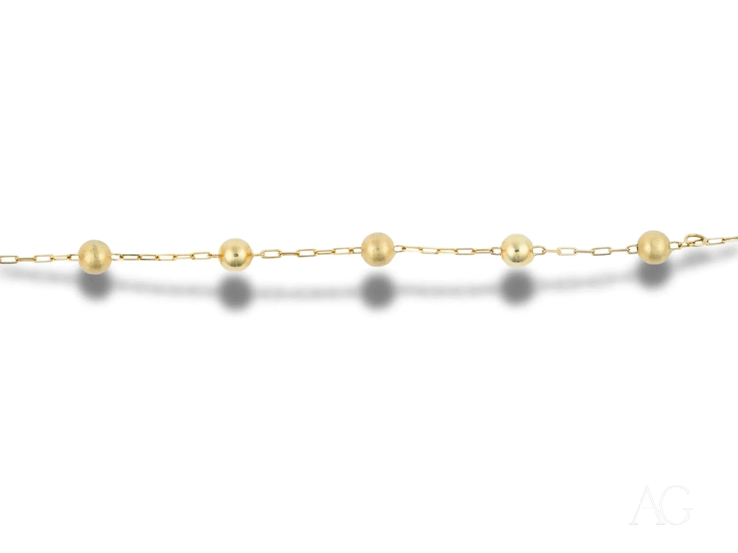 Elegant 18k gold bracelet with spring ring clasp and pearl-like beads design