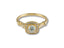 Gold engagement ring featuring a cushion-cut center diamond in 18k yellow gold halo setting