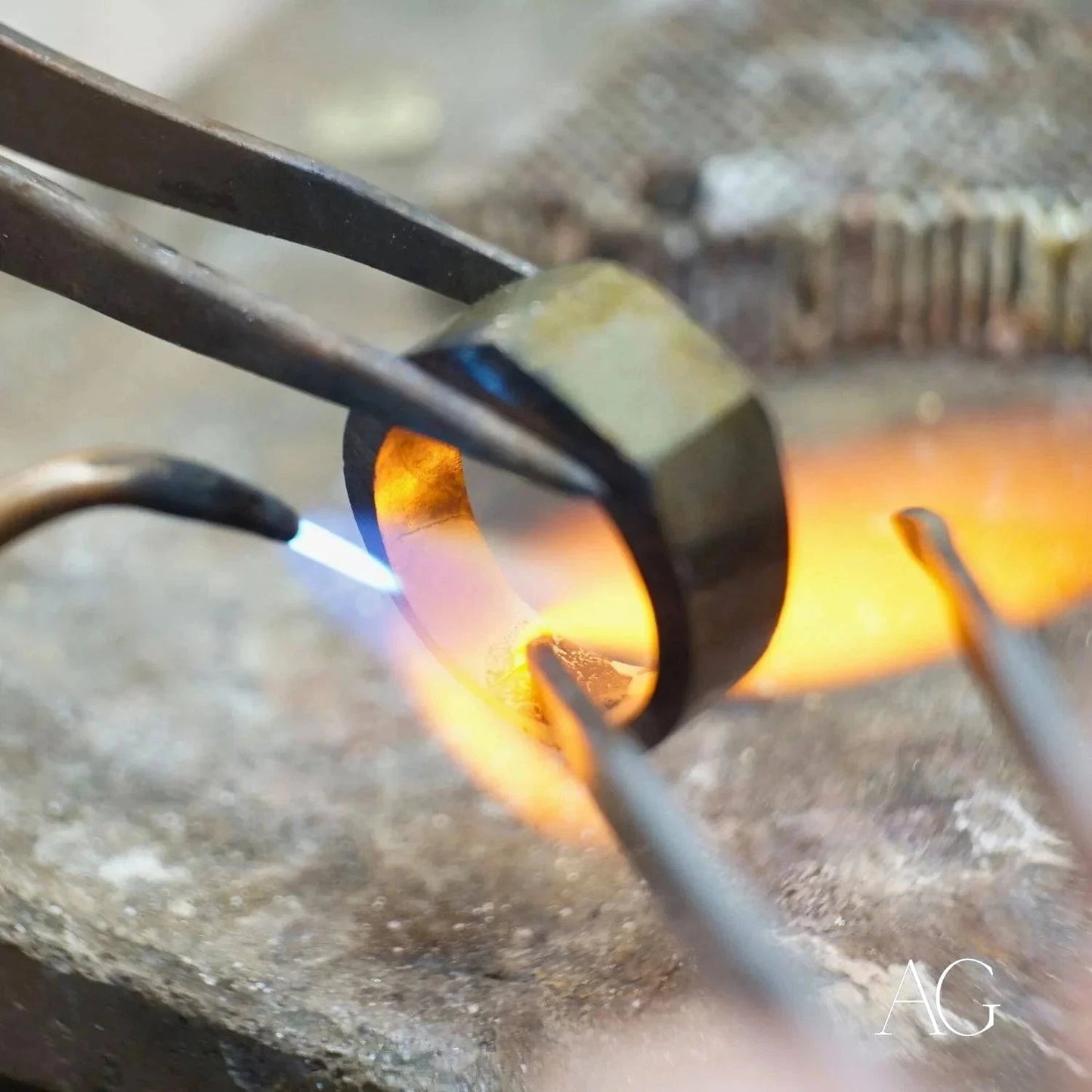 Metal ring heating with flame for Art Gold jewelry repair in gold jewelry restoration