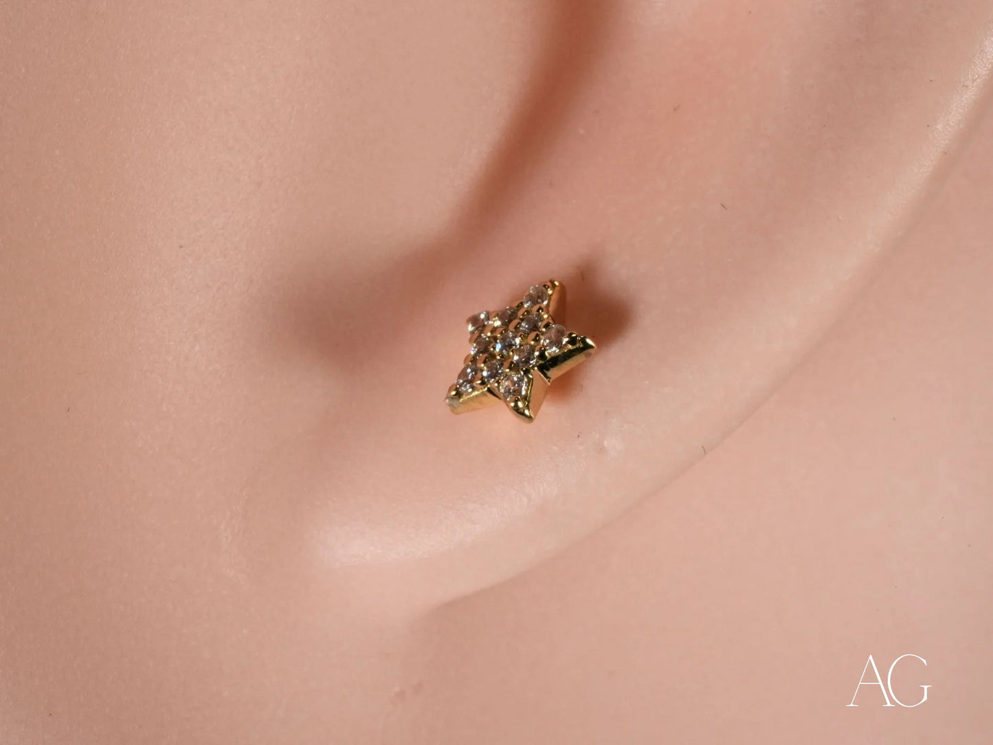 Gold Star Earrings with embedded gems, a stunning piece of Art Gold Jewelry