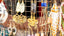 Jewelry display with various earrings and necklaces.
