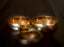 pair of gold-colored wedding band