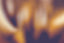 a blurry image of a yellow and brown object