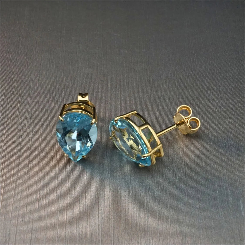 18 Carat Gold Earrings with Blue Topaz | Home page