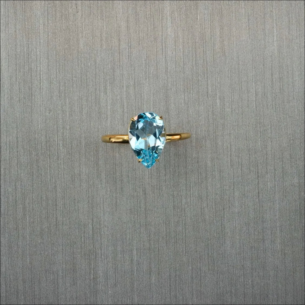 18 Carat Gold Ring with Blue Topaz | Home page