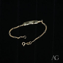 Gold chain bracelet with engraved plate featuring 18k gold personalized ID bracelet timeless elegance