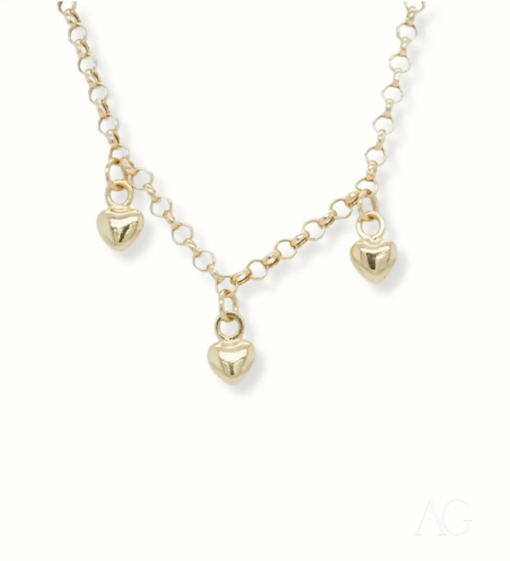 Gold-toned 18k Gold Heart Charm Anklet with three heart-shaped charms on a delicate chain