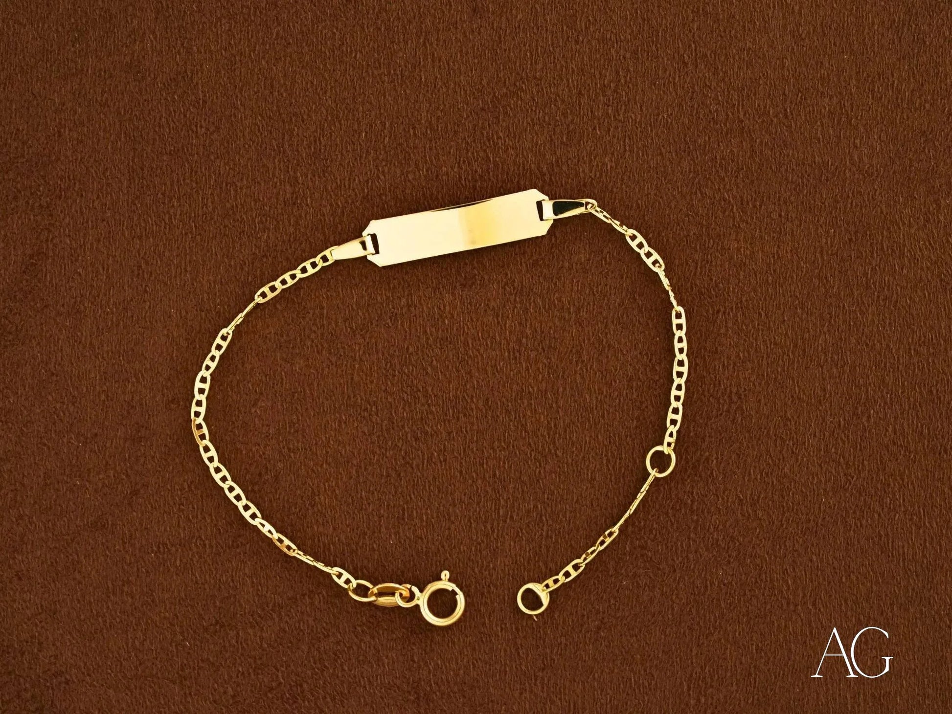 Gold chain bracelet with identification plate and spring ring lock for kids