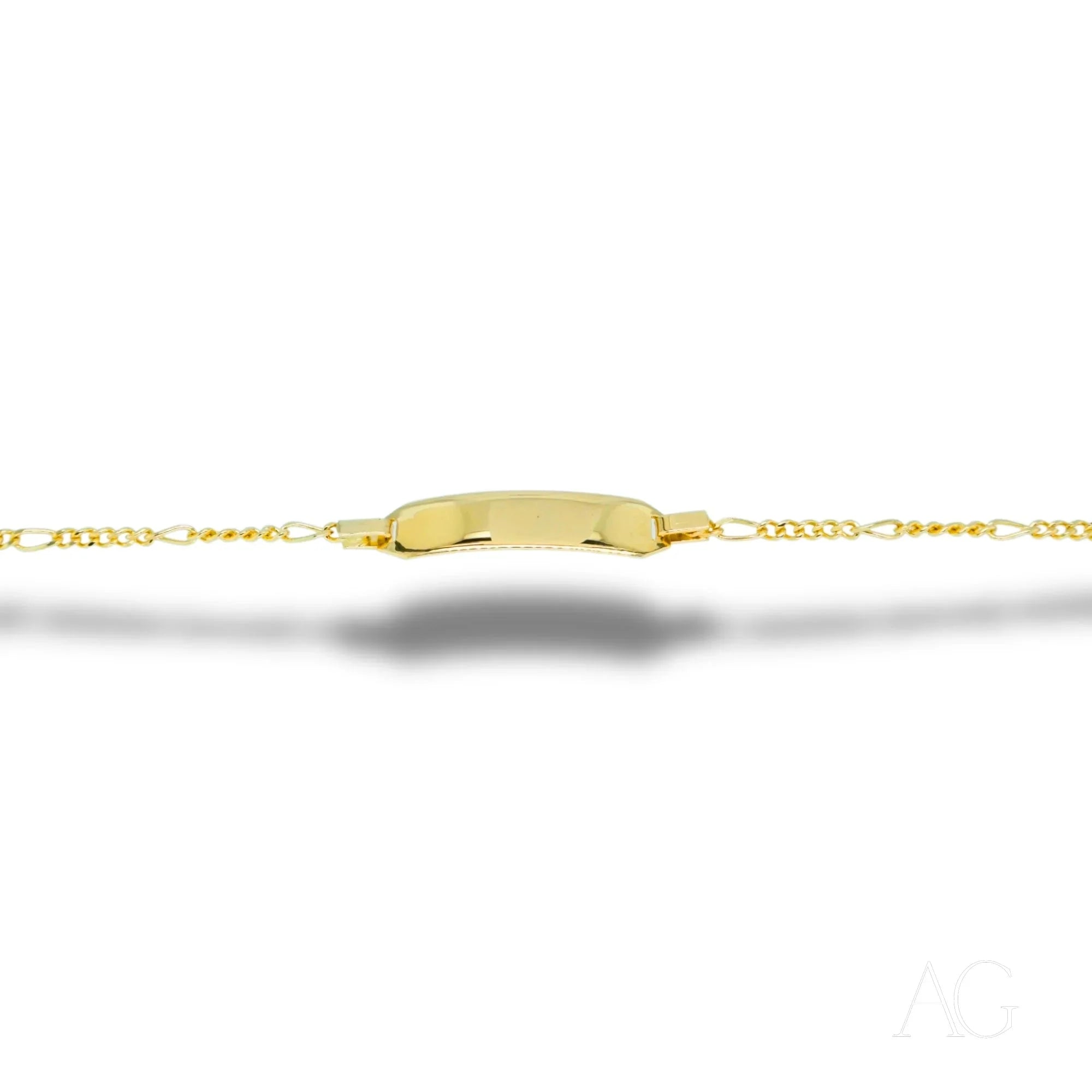 Gold personalized ID bracelet for kids on a delicate chain, showcasing timeless elegance in 18k gold