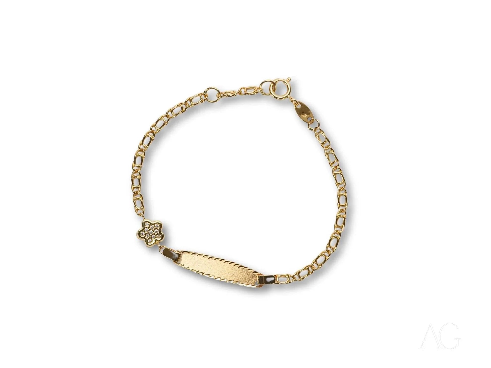 Gold bracelet with name plate, heart charm, flower motif, and spring ring lock in 18k gold