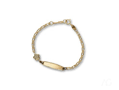 Gold bracelet with name plate, heart charm, flower motif, and spring ring lock in 18k gold