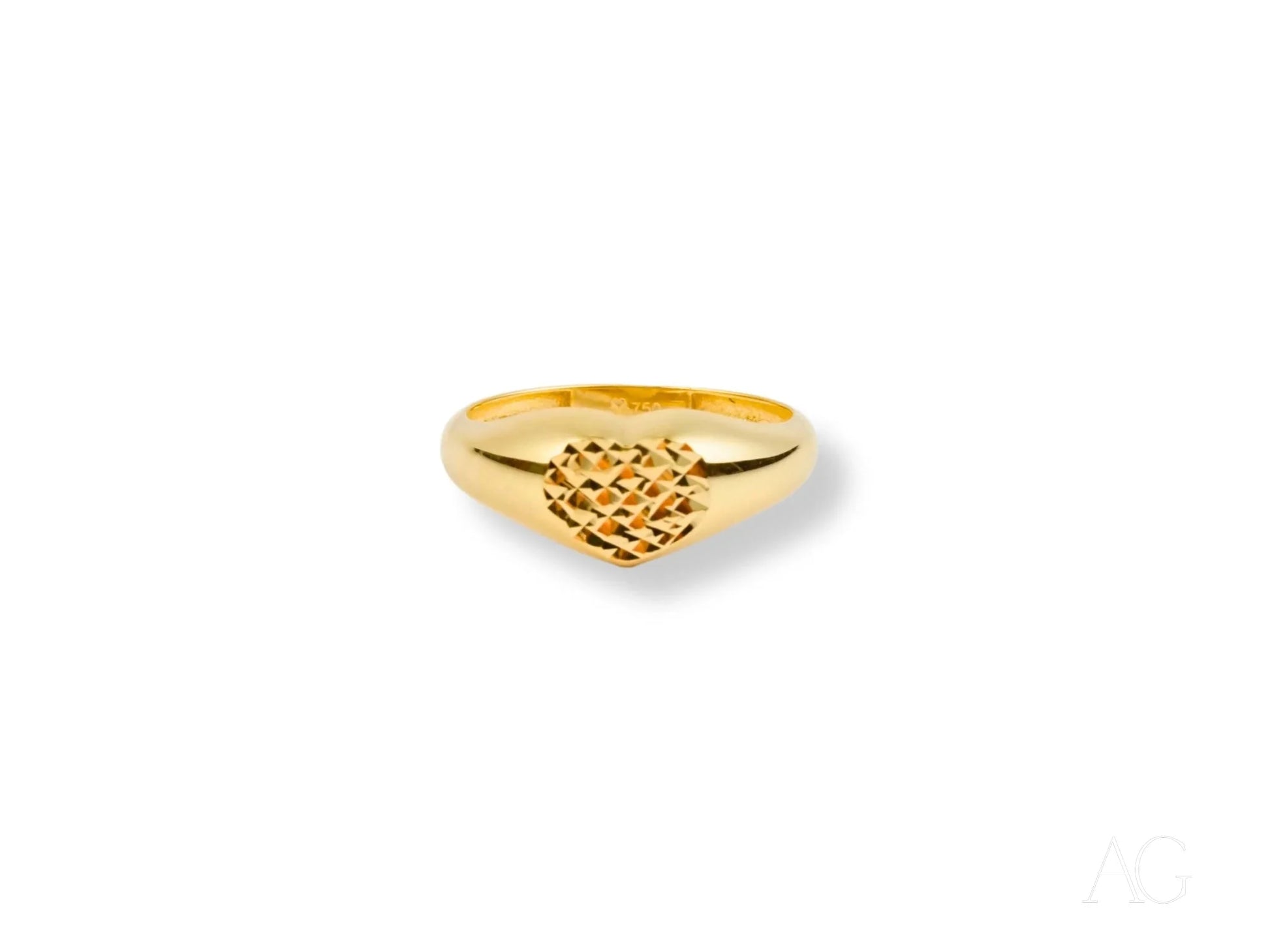 Gold ring with heart-shaped design, showcasing 18k yellow gold elegance and love