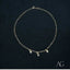 18k Gold Heart Charm Anklet with three heart charms on a delicate chain.