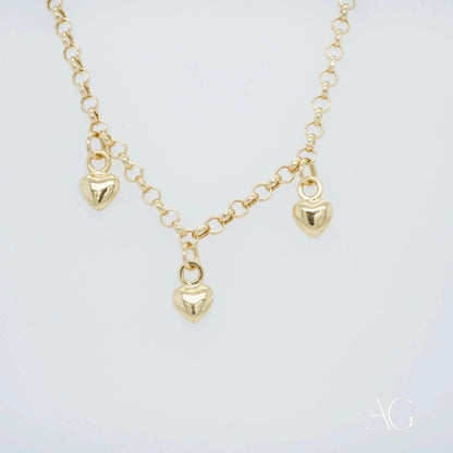 18k Gold necklace with three heart charms for elegant jewelry collection