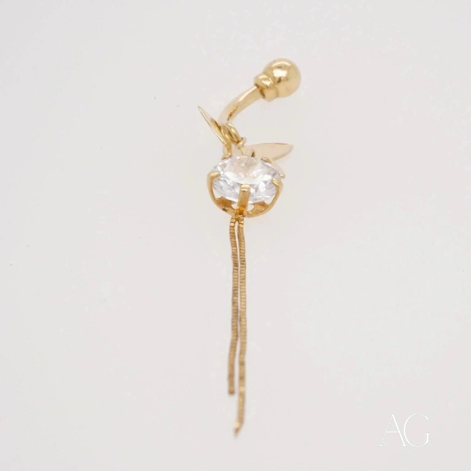 Gold-toned belly button piercing with cubic zirconia butterfly and dangling chain