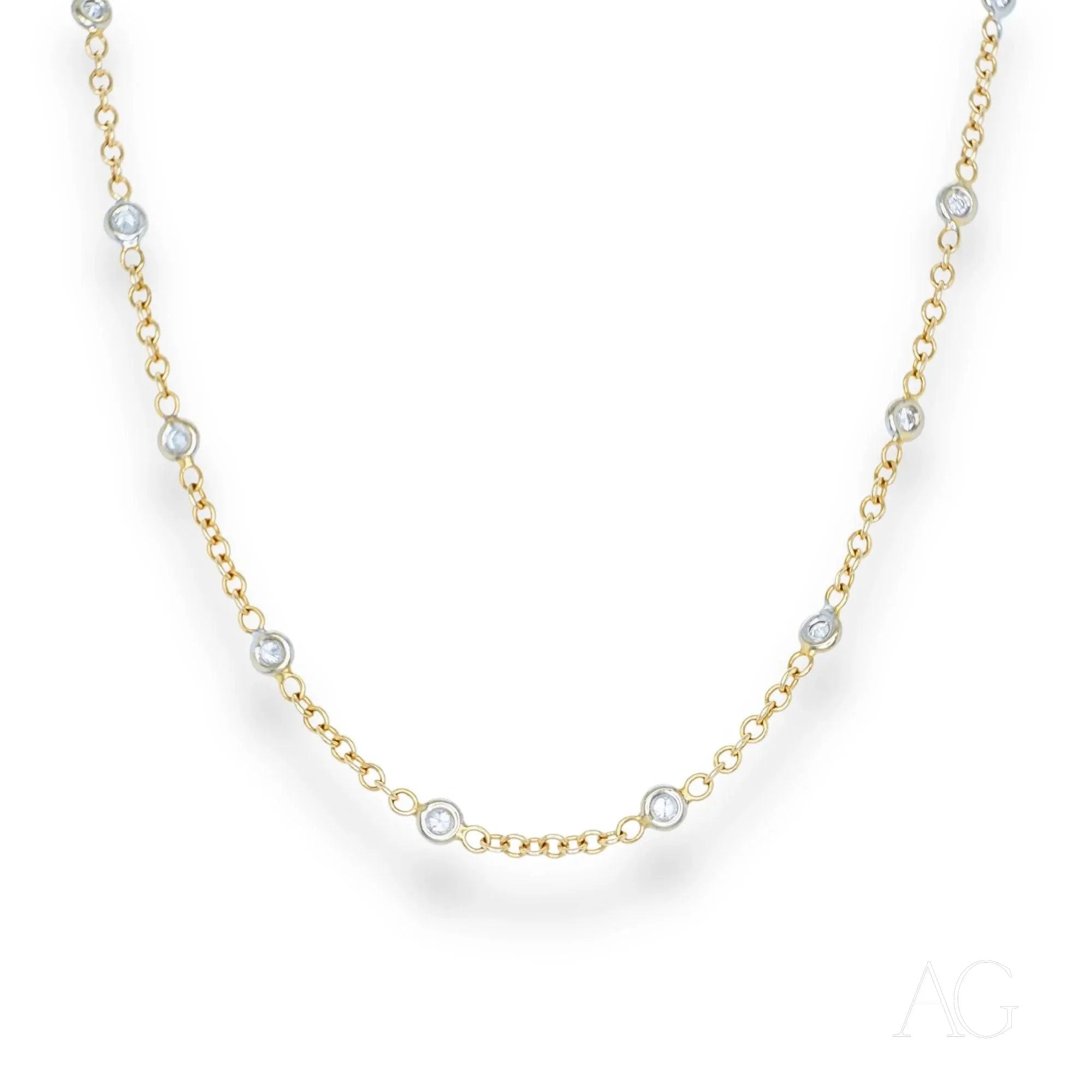 Delicate 18k gold diamond anklet featuring spaced diamond accents for elegant style