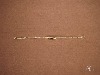 Delicate 18k gold kid’s bracelet with jaseron mesh and lobster lock centerpiece