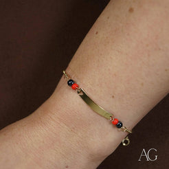 Delicate 18k Gold Kids Bracelet featuring Black Coral and Heart Symbol accents