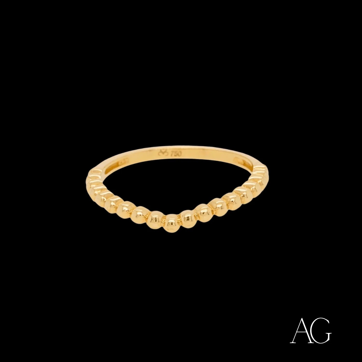 Delicate 18k gold elegant ring featuring a curved line of small beads