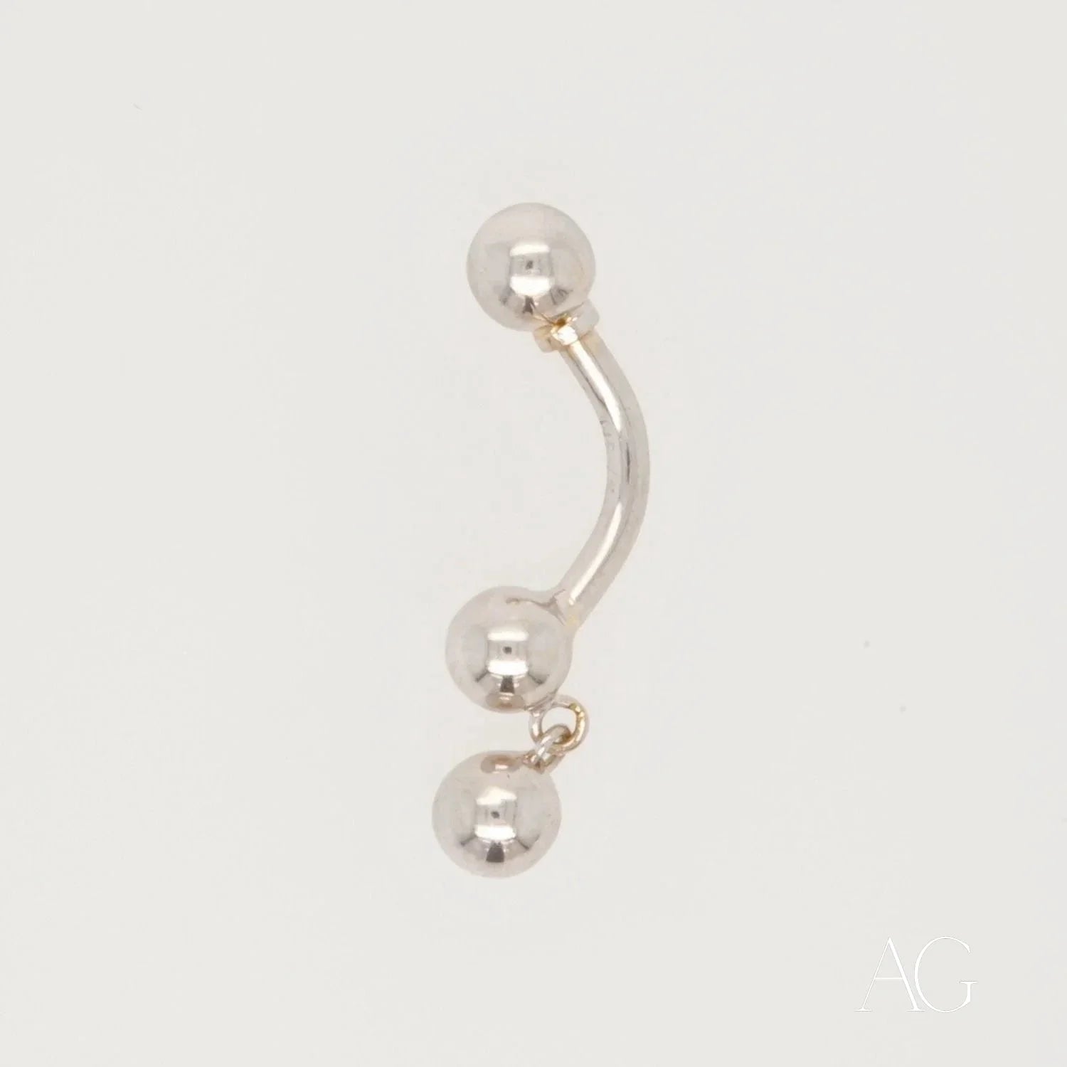 Curved 18k White Gold body piercing jewelry with three spherical beads