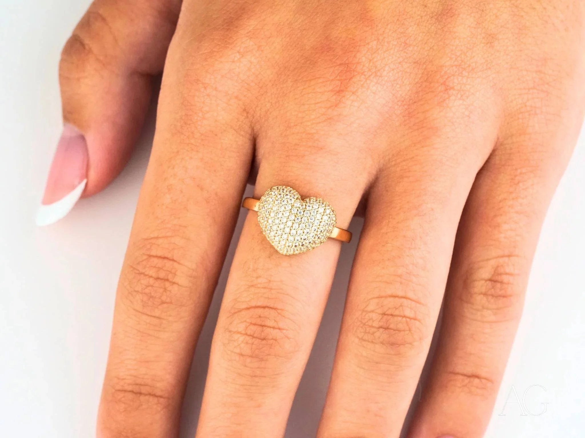 Heart-shaped diamond ring in 18k yellow gold showcasing elegance and love