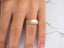 Celestial Grace Two-Tone Gold Wedding Band featuring 14k gold and inset diamonds
