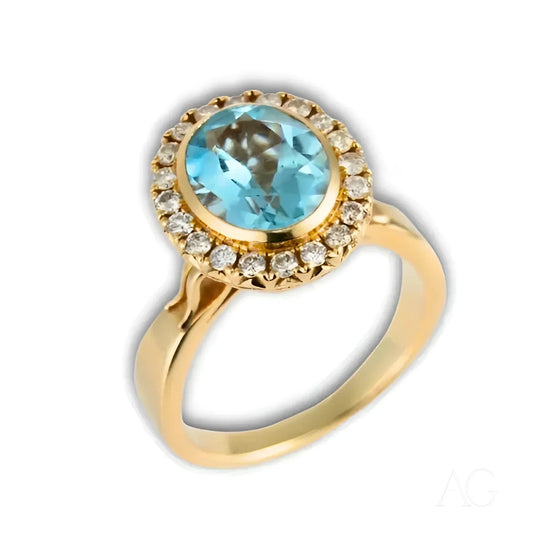 Custom Made Ring in 18k Gold featuring round Blue Topaz and Diamonds