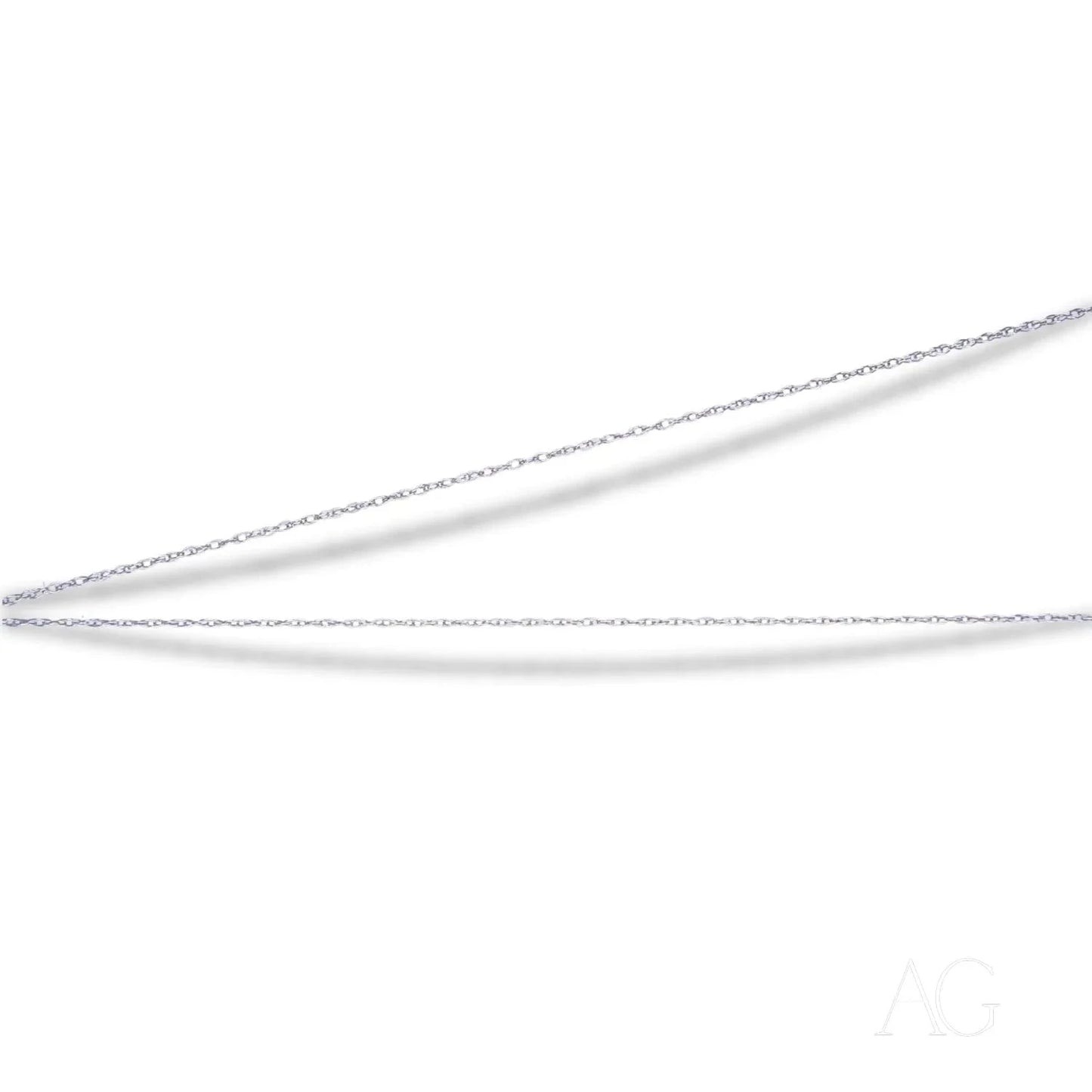Thin metal tweezers with pointed tips beside a Dainty 14k White Gold rope chain