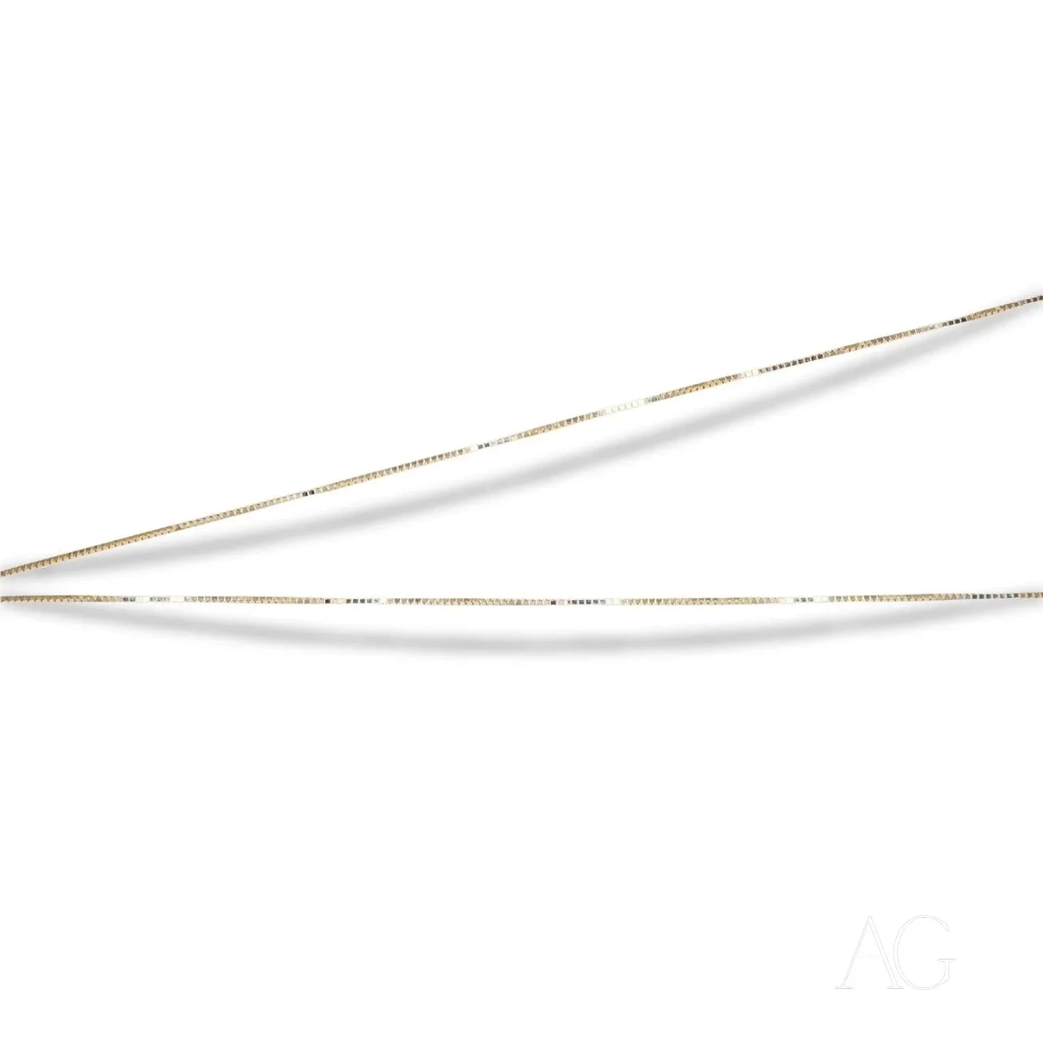 Two delicate 14k gold slim needles showcased with a 14k gold box chain
