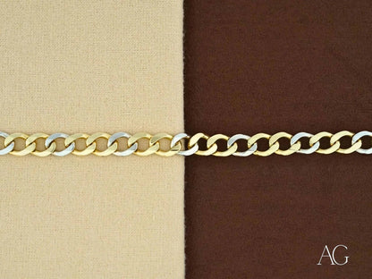 Gold chain necklace on a two-toned background showcasing art gold jewelry elegance
