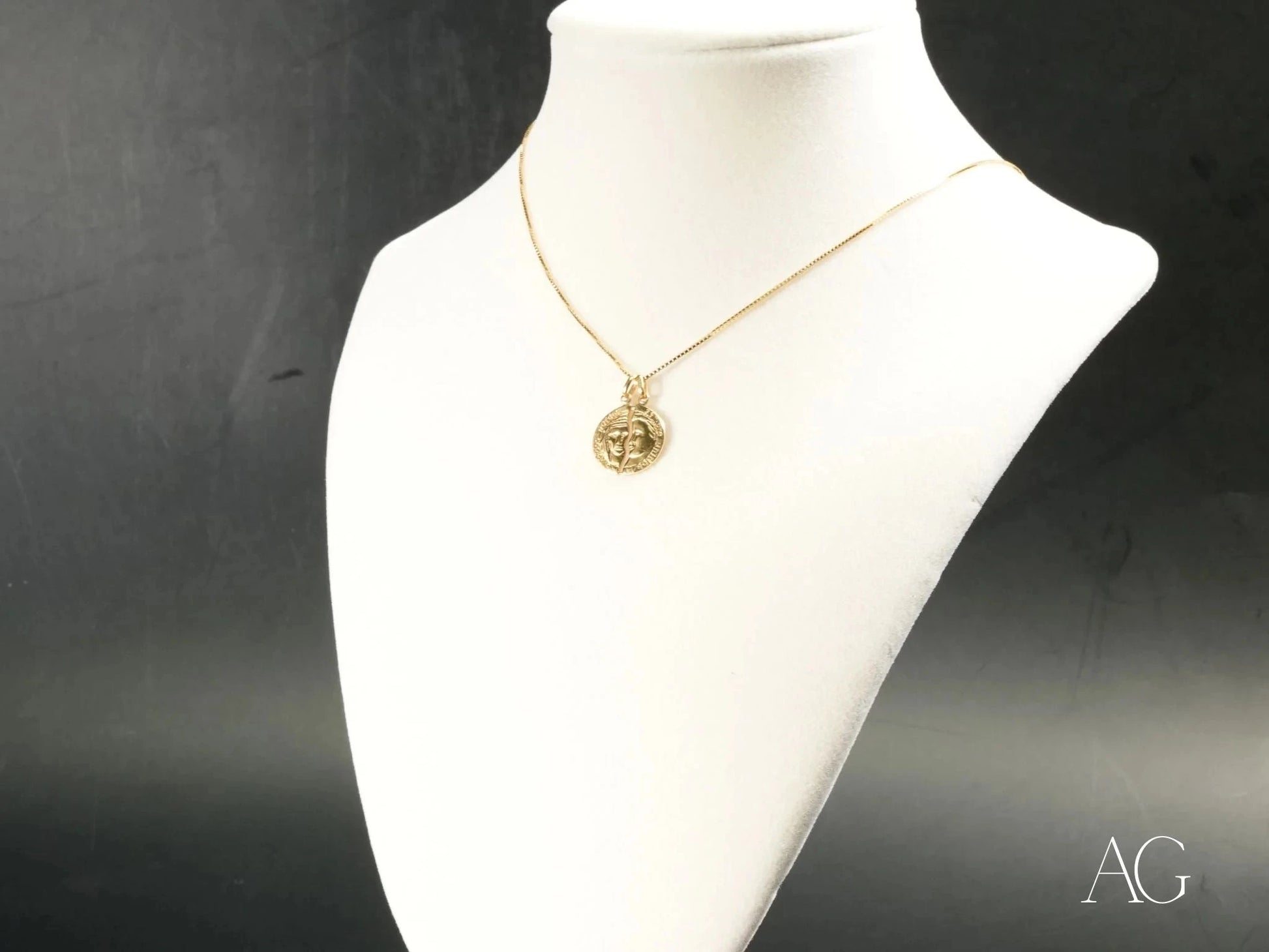 18k Gold Dual Harmony Pendant Necklace featuring Two Faces on a white jewelry bust