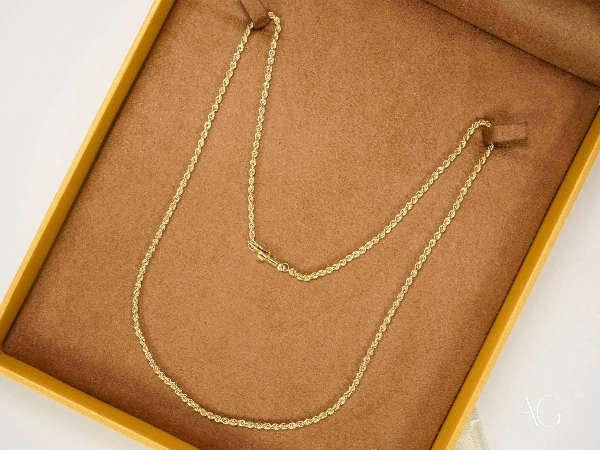 Elegant 14k gold rope chain necklace in jewelry box with secure barrel lock