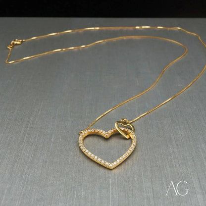 Elegant 18k Gold Heart Necklace with diamond accents in beautiful gold jewelry design
