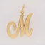 Elegant 18k Gold Letter M Pendant with polished mirror finish, symbolizing personalized luxury and sophistication.