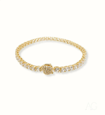 Elegant Gold Tennis Bracelet featuring a floral diamond cluster in art gold design