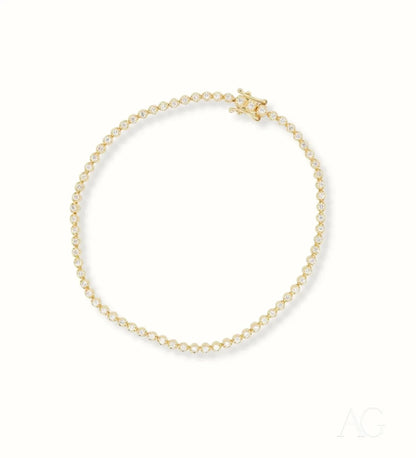 Delicate gold jewelry tennis bracelet featuring round beads and a star-shaped clasp