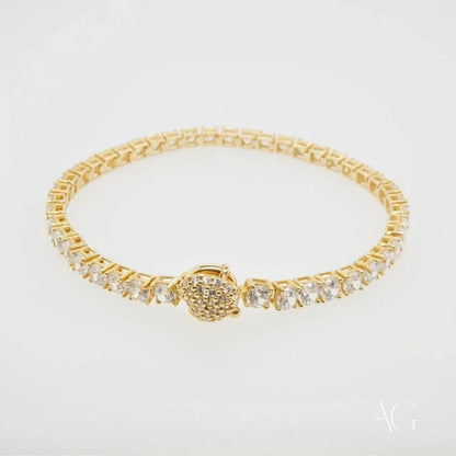 Elegant Zirconia Tennis Bracelet featuring a gold design with diamond-encrusted centerpiece