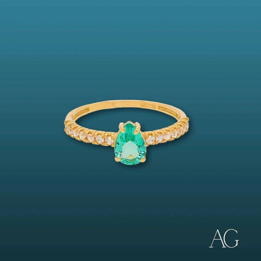 Elegant 18k Gold Ring with Pear-Shaped Green Emerald and Diamond Accents