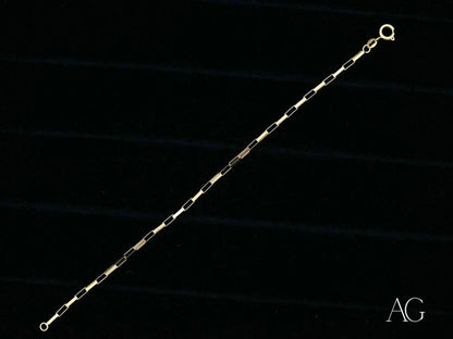 Delicate solid 18k gold brick link bracelet showcasing alternating bar links