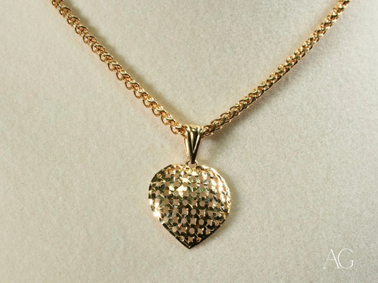 18k Gold heart pendant necklace featuring a textured hammered surface in stunning design