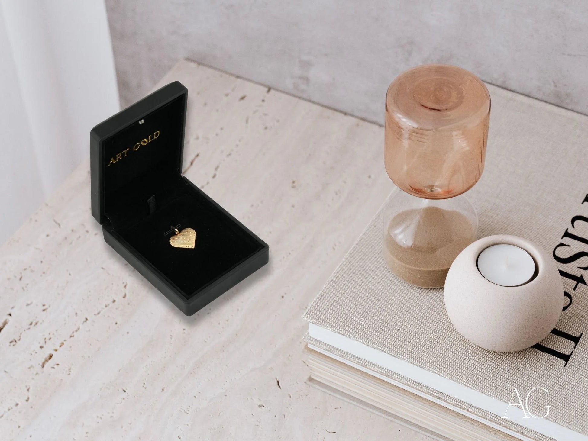 Black jewelry box showcasing an 18k gold heart pendant, the Golden Heart