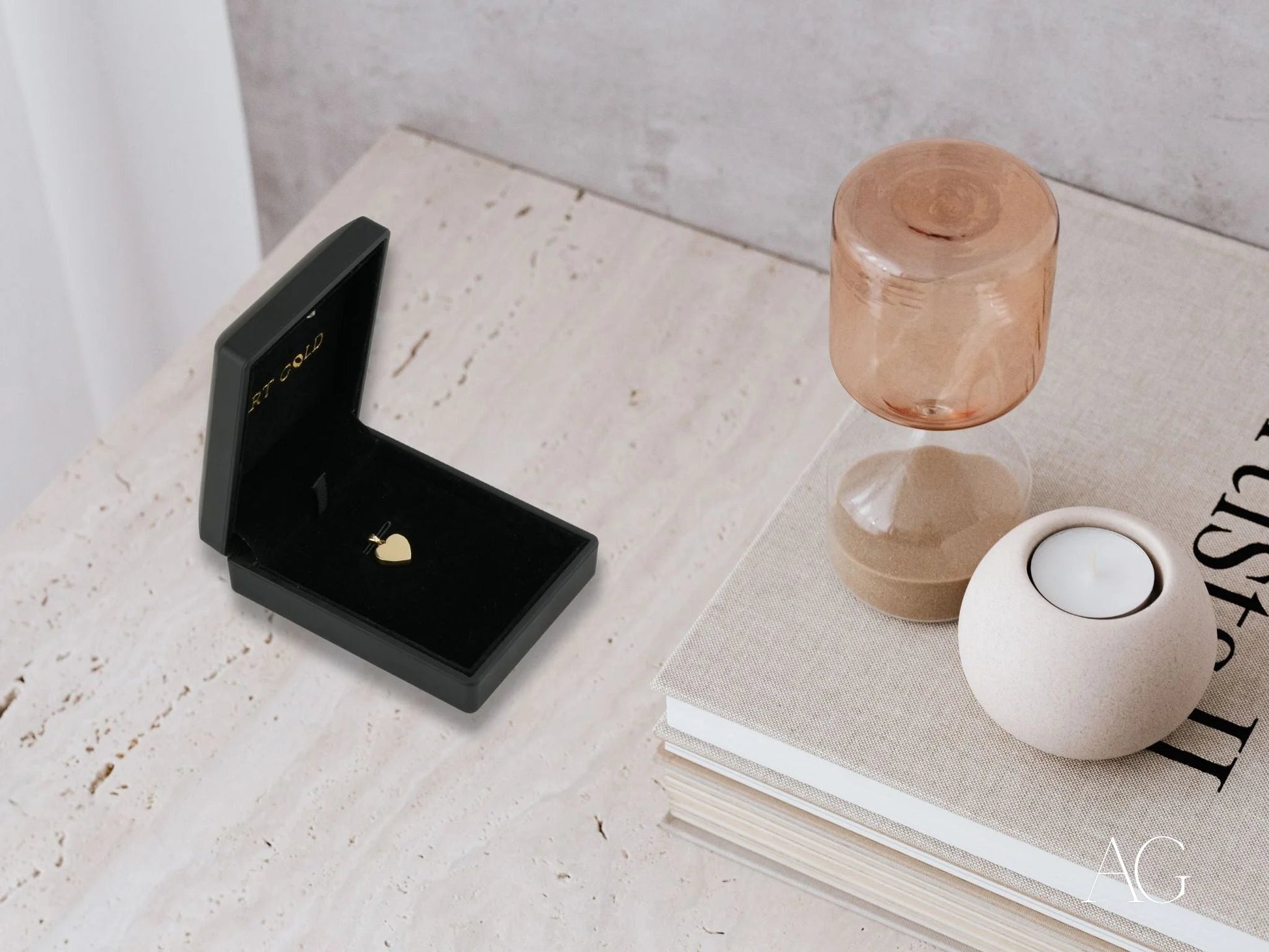 Black jewelry box showcasing an 18k gold Golden Heart Pendant ring