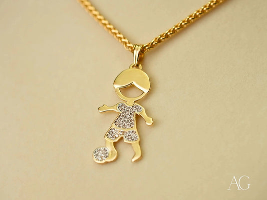 18k Gold pendant necklace featuring a boy with a soccer ball in Golden Moments design