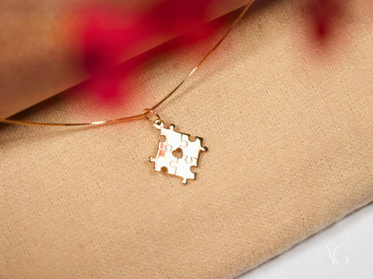 Gold puzzle piece pendant necklace for autism awareness, featuring a golden puzzle design