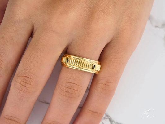 14k Gold Majestic Weave Wedding Band featuring a textured band on a finger