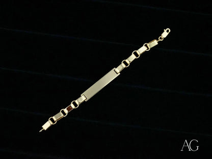 Gold bracelet with rectangular links and central bar in solid 18k gold design
