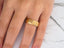 14k Gold Stellar Strands Wedding Band set stacked on a finger for elegant style